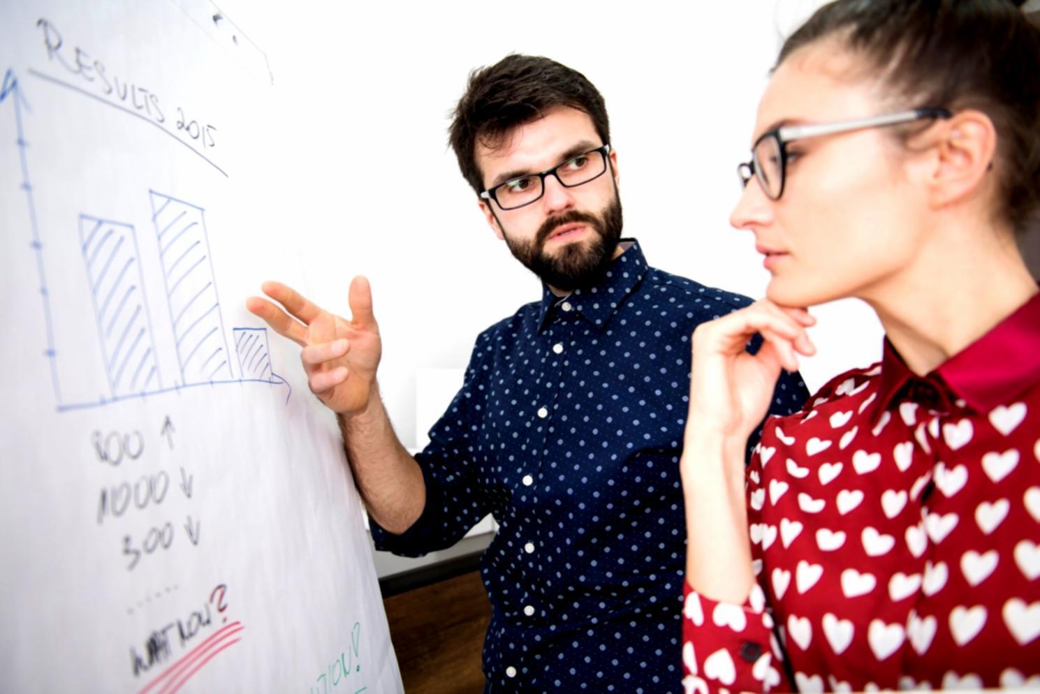 Financial analysis workspace with charts and documents